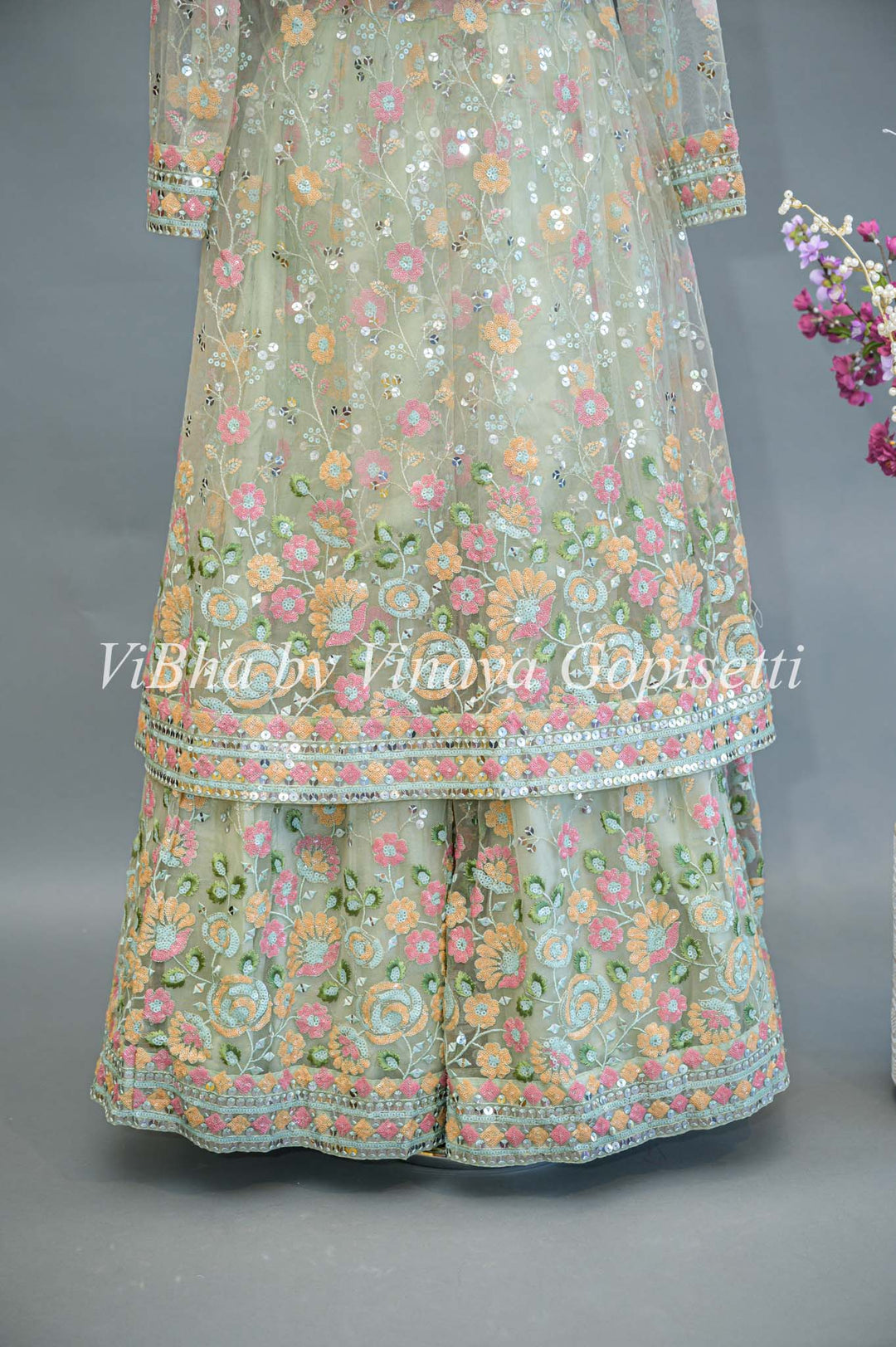 Pastel Green Net Embroidered Lehenga With Detachable Jacket