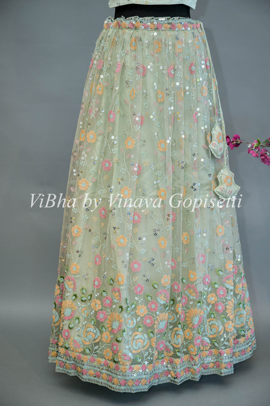 Pastel Green Net Embroidered Lehenga With Detachable Jacket