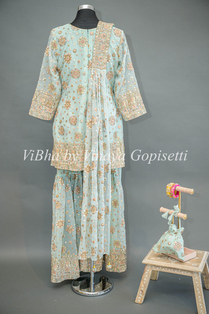 Pastel Blue Embroidered Sharara Set With Choker Dupatta And Matching Potli Bag