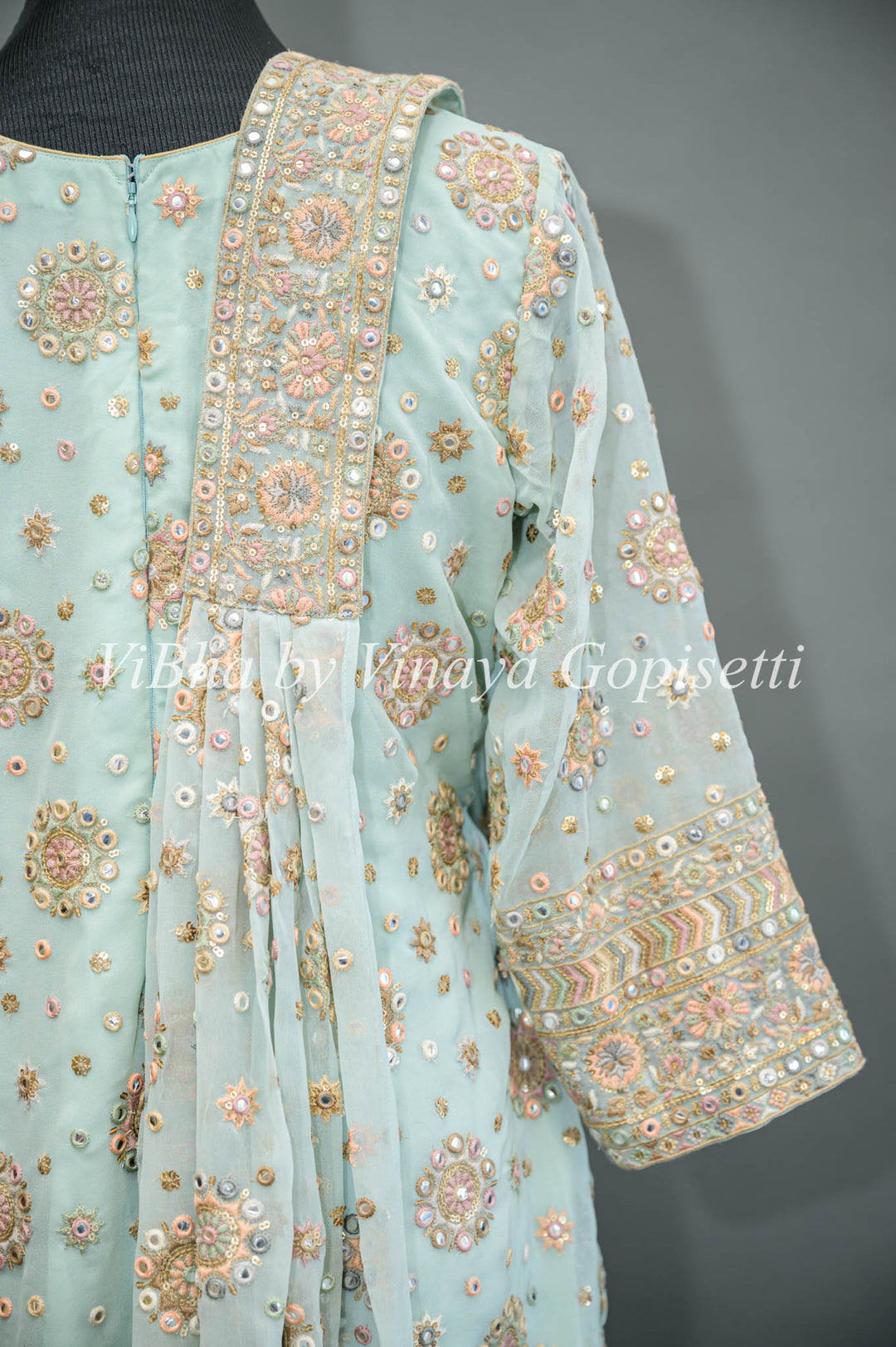 Pastel Blue Embroidered Sharara Set With Choker Dupatta And Matching Potli Bag