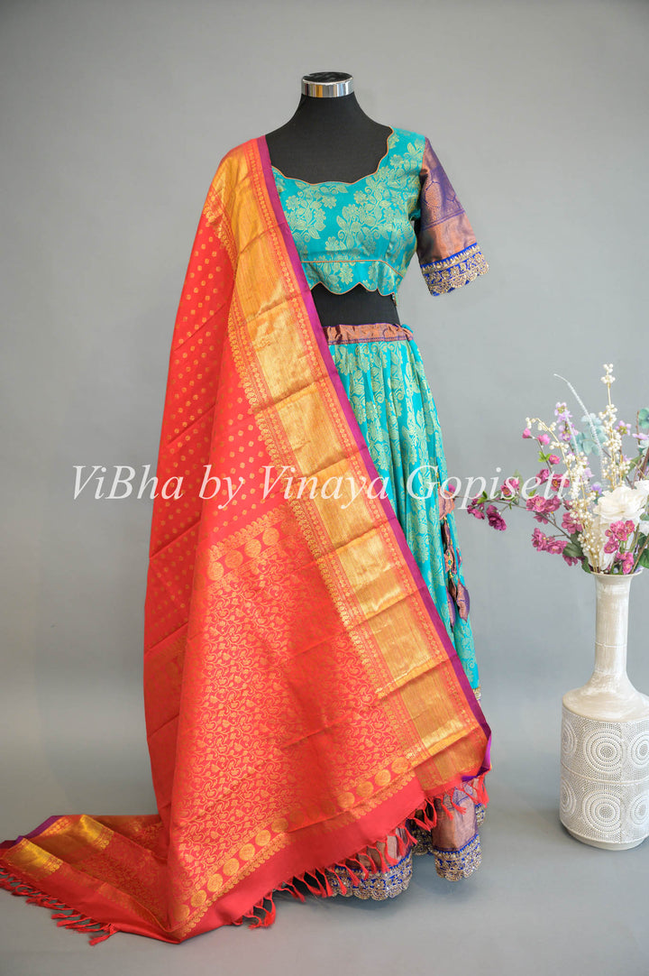 Turquoise and Royal Blue Kanchi Silk Lehenga With Embroidered Borders And Red Kanchi Silk Dupatta