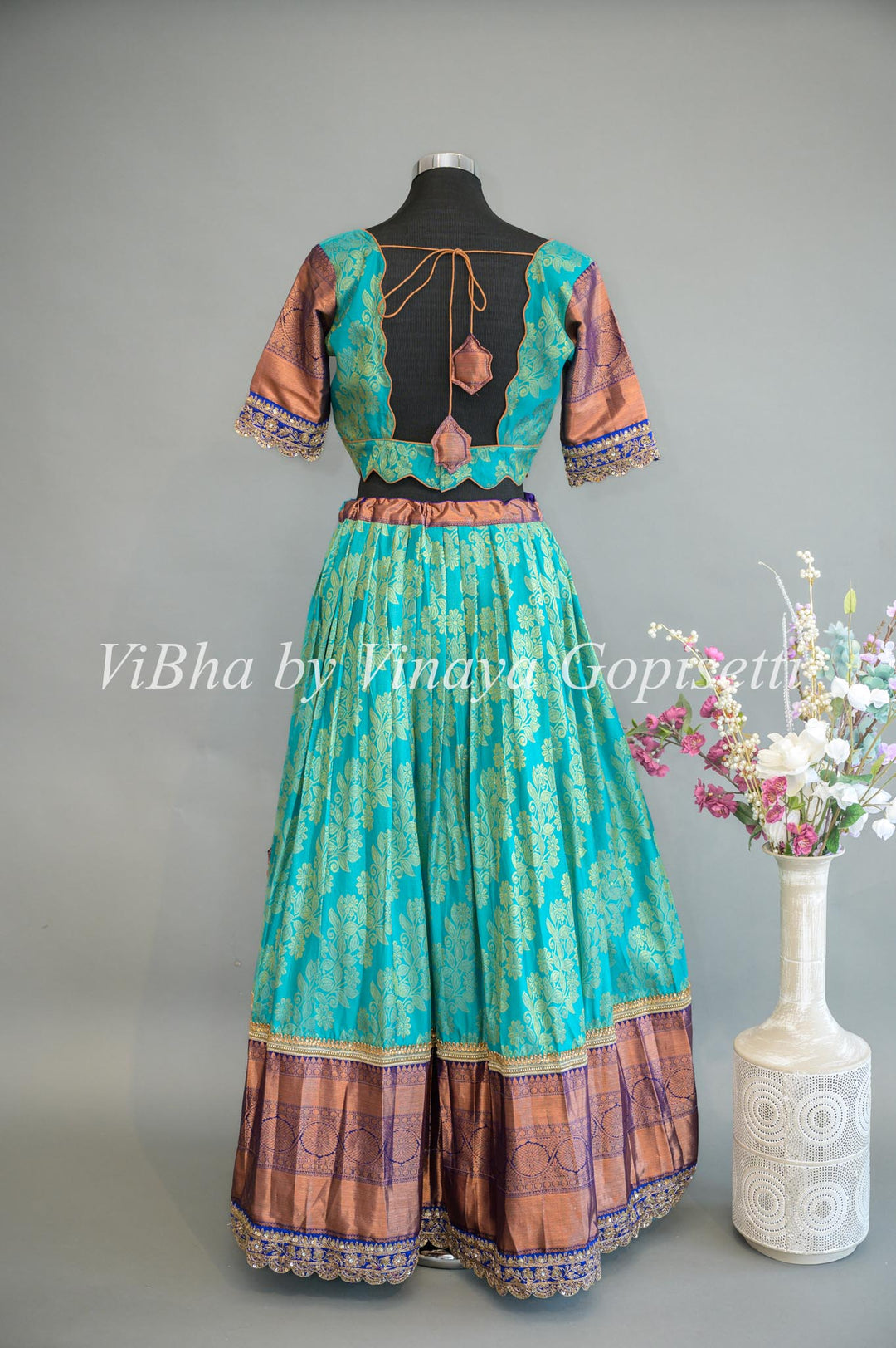 Turquoise and Royal Blue Kanchi Silk Lehenga With Embroidered Borders And Red Kanchi Silk Dupatta