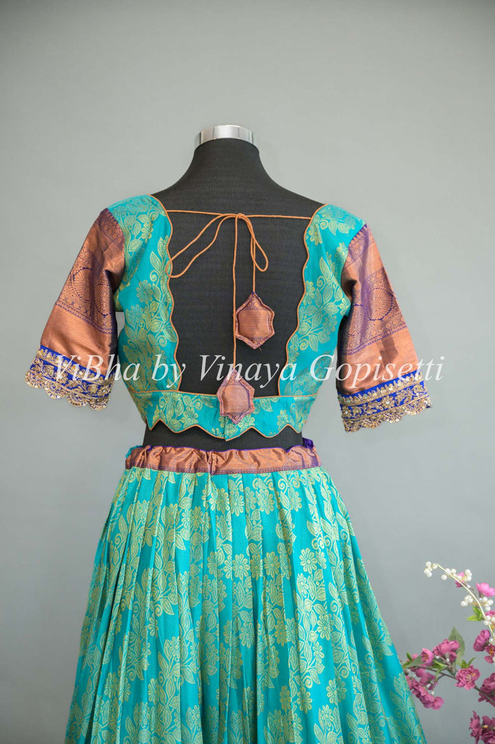 Turquoise and Royal Blue Kanchi Silk Lehenga With Embroidered Borders And Red Kanchi Silk Dupatta