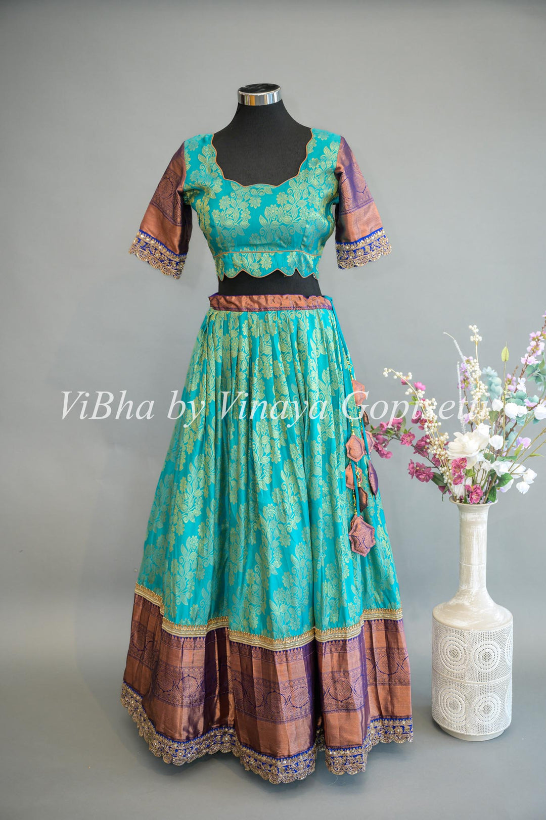 Turquoise and Royal Blue Kanchi Silk Lehenga With Embroidered Borders And Red Kanchi Silk Dupatta