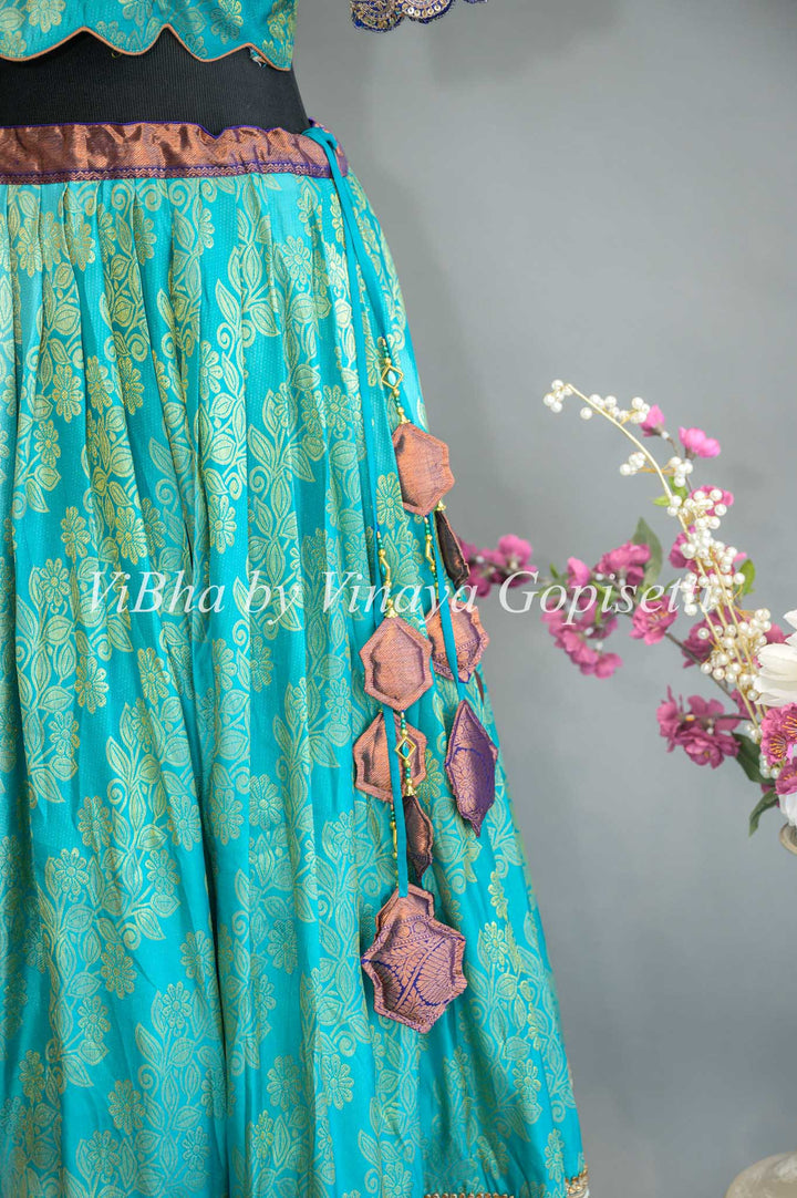 Turquoise and Royal Blue Kanchi Silk Lehenga With Embroidered Borders And Red Kanchi Silk Dupatta