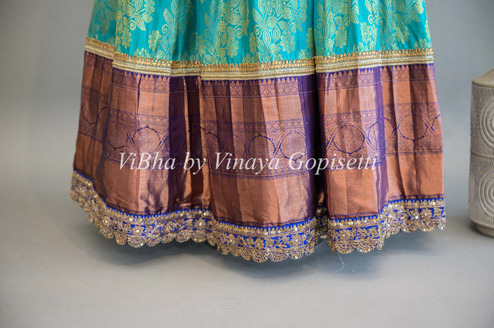 Turquoise and Royal Blue Kanchi Silk Lehenga With Embroidered Borders And Red Kanchi Silk Dupatta