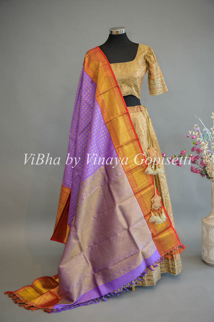 Pastel Green Copper Zari Kanchi Silk Lehenga With Embroidered Borders And Purple Kanchi Silk Dupatta