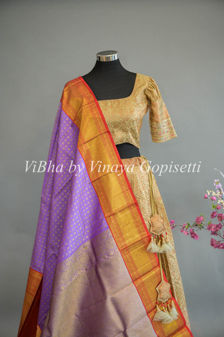 Pastel Green Copper Zari Kanchi Silk Lehenga With Embroidered Borders And Purple Kanchi Silk Dupatta