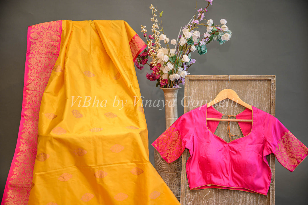 Yellow and Rani Pink Banarasi Katan Silk Saree And Blouse