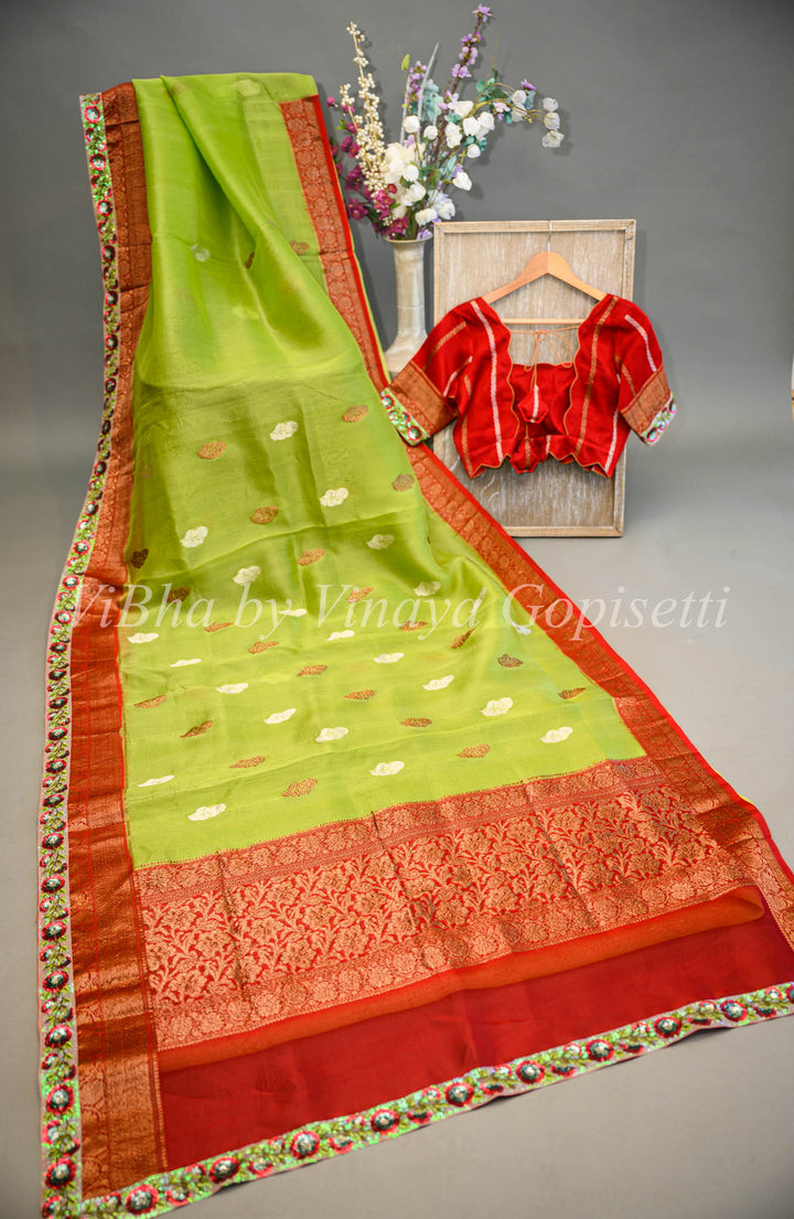 Parrot Green and Red Banarasi Organza Saree Embellished With Embroidered Borders