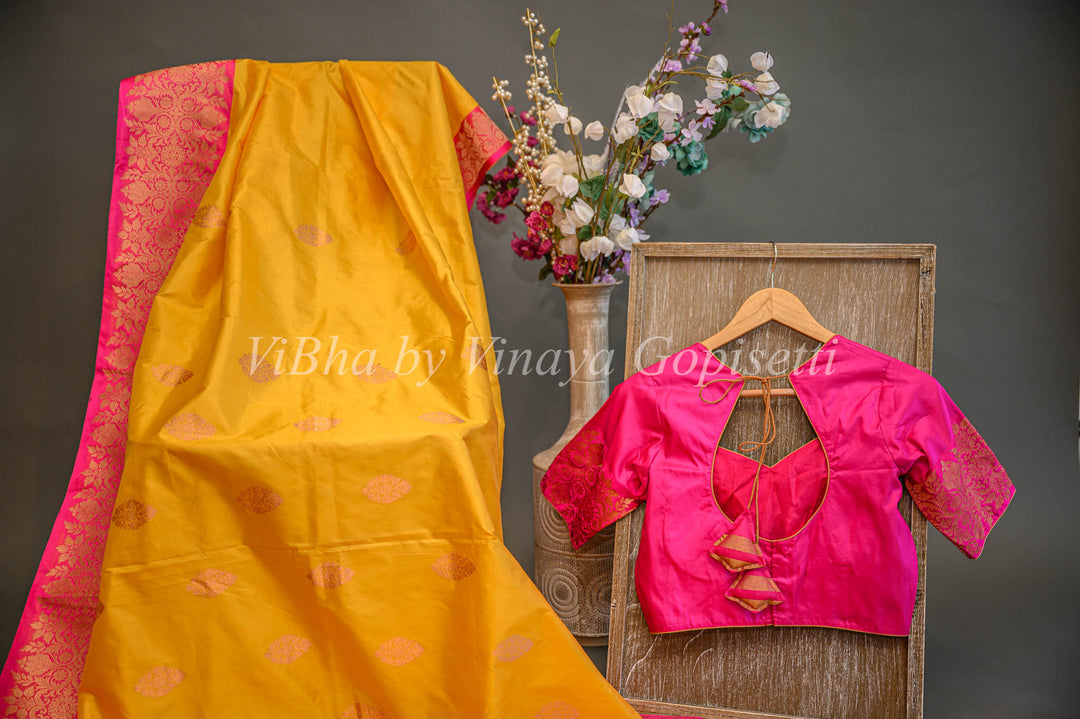 Yellow and Rani Pink Banarasi Katan Silk Saree And Blouse