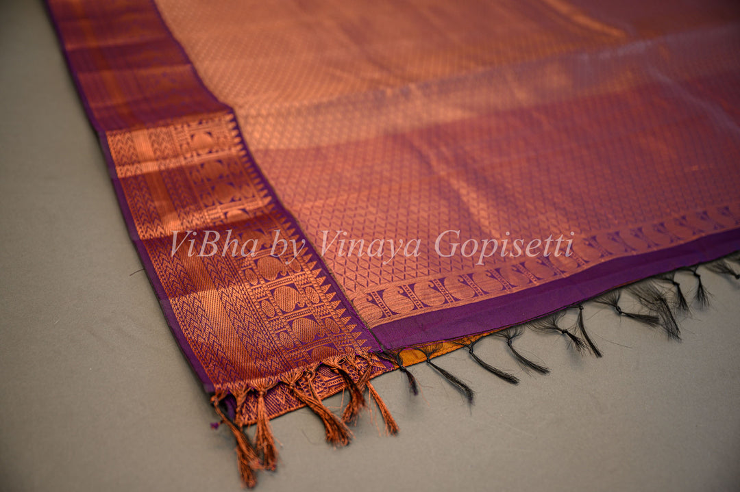 Deep Mustard And Purple Kanchi Silk Saree And Blouse With Copper Zari