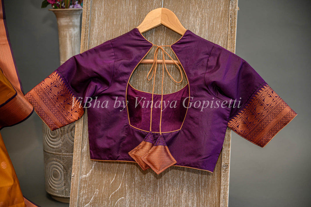 Deep Mustard And Purple Kanchi Silk Saree And Blouse With Copper Zari