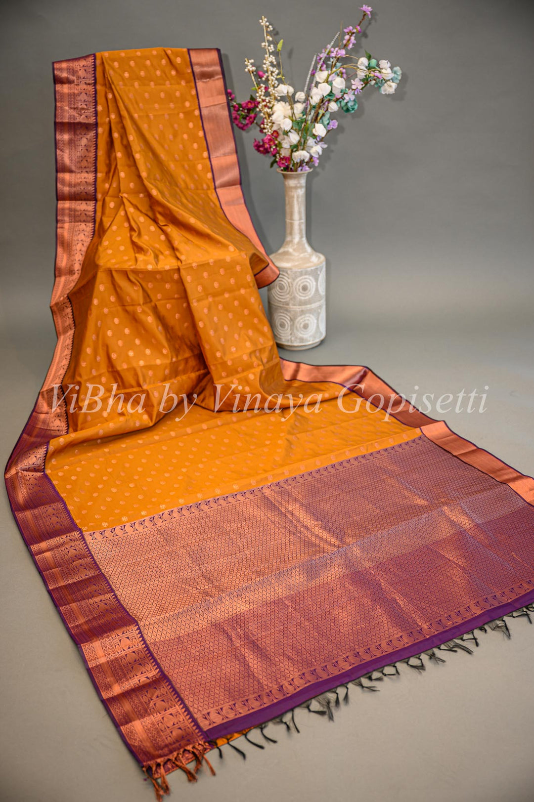 Deep Mustard And Purple Kanchi Silk Saree And Blouse With Copper Zari