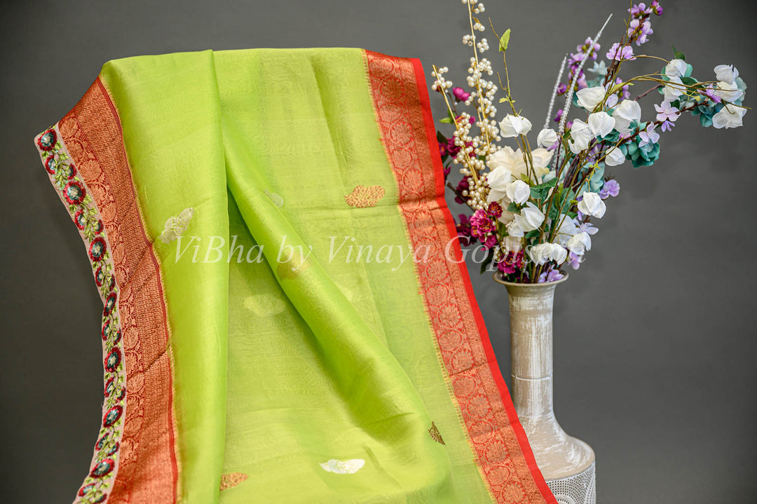 Parrot Green and Red Banarasi Organza Saree Embellished With Embroidered Borders