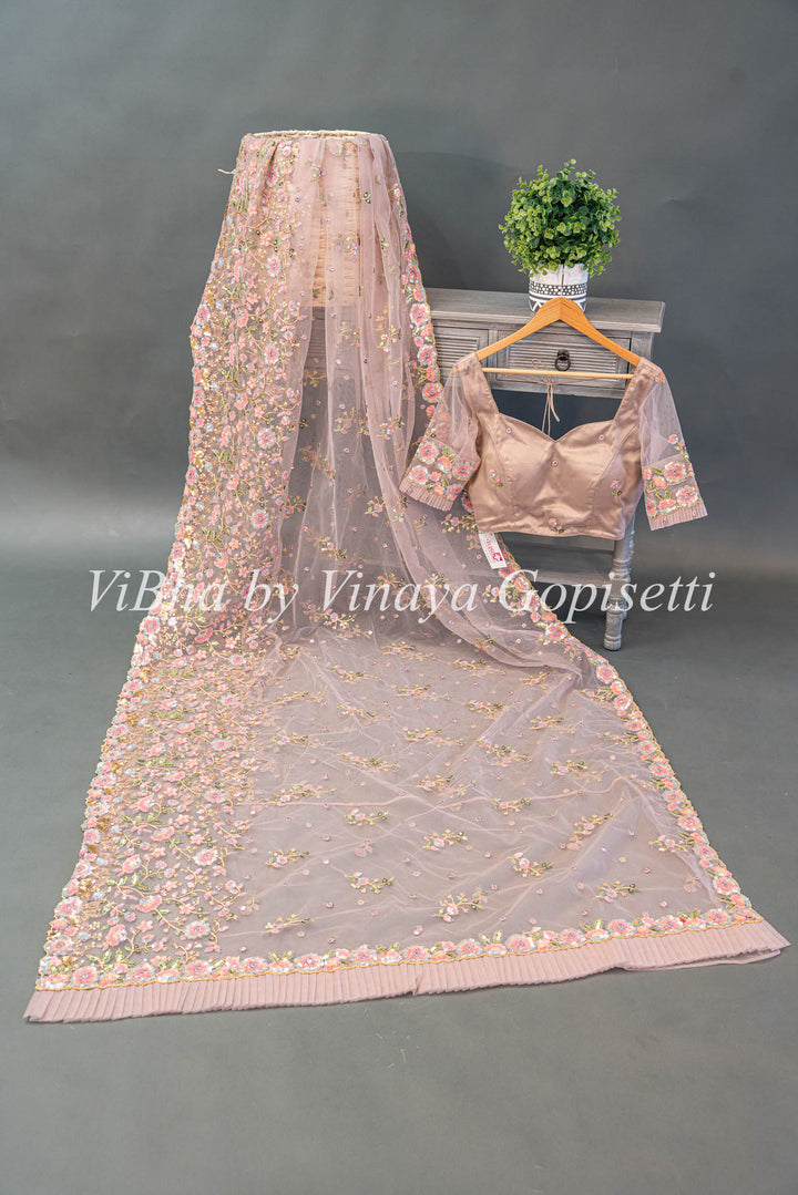 Pastel Mauve Net Floral Embroidered Saree And Blouse