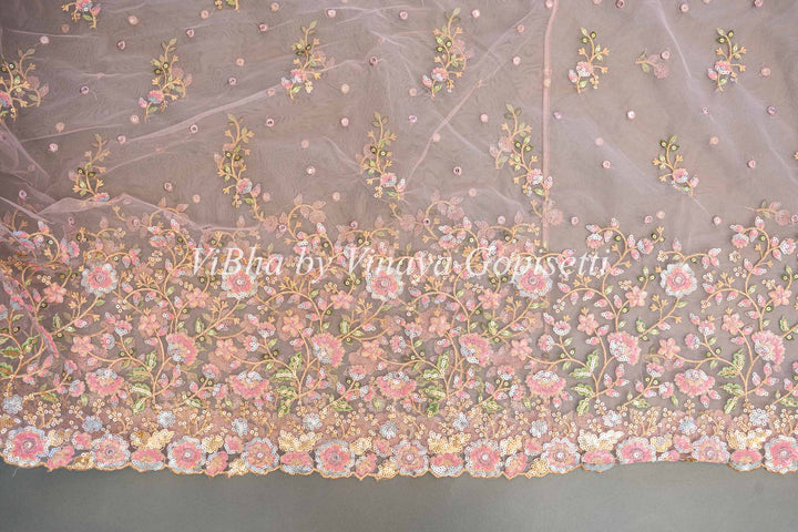 Pastel Mauve Net Floral Embroidered Saree And Blouse