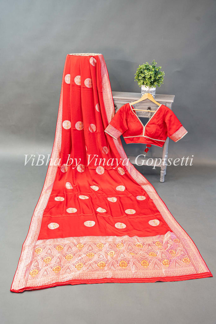 Red Raw Mango Banarasi Silk Saree And Blouse with Gold And Silver Zari Motifs And Borders