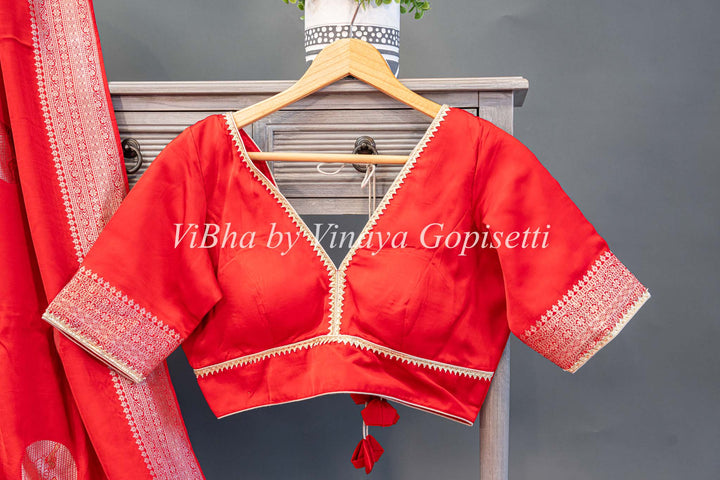 Red Raw Mango Banarasi Silk Saree And Blouse with Gold And Silver Zari Motifs And Borders