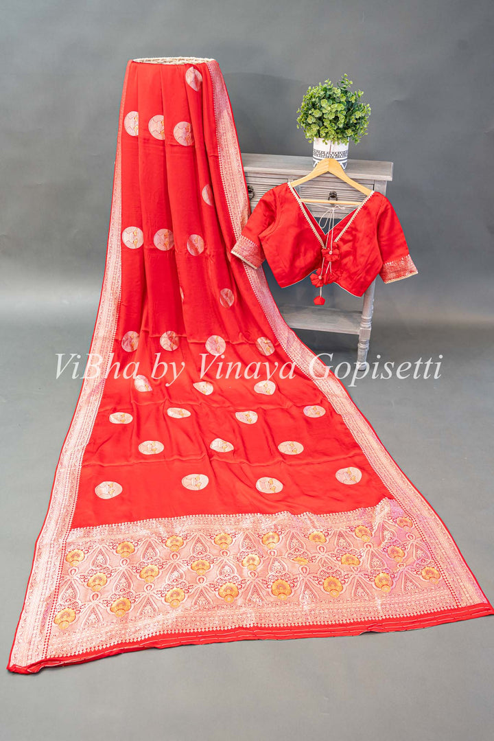 Red Raw Mango Banarasi Silk Saree And Blouse with Gold And Silver Zari Motifs And Borders