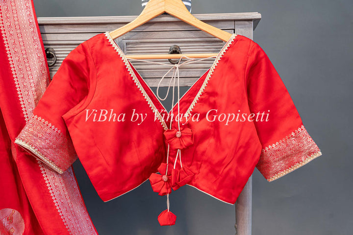 Red Raw Mango Banarasi Silk Saree And Blouse with Gold And Silver Zari Motifs And Borders