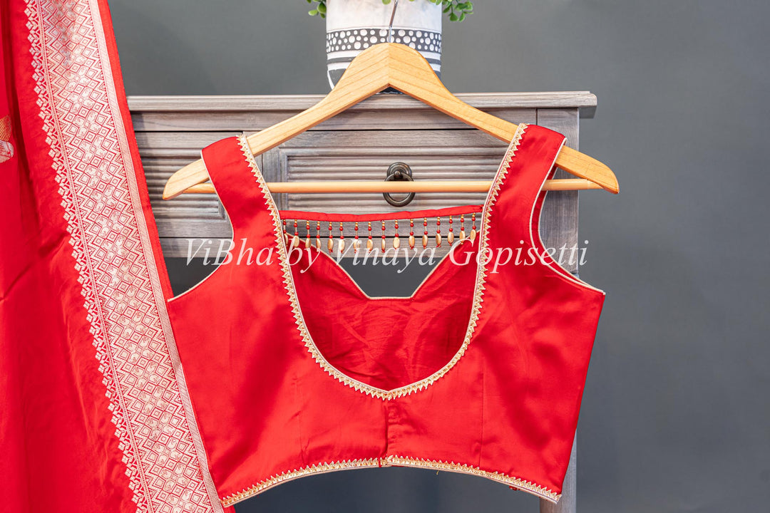 Red Raw Mango Banarasi Silk Saree And Sleeveless Blouse