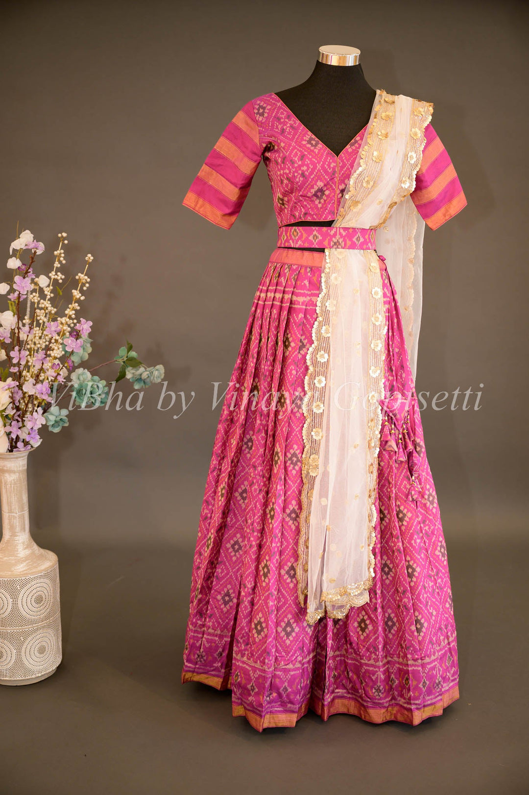 Lehengas - Magenta Patola Silk Lehenga With V Neck Blouse And Pearl White Embroidered Dupatta