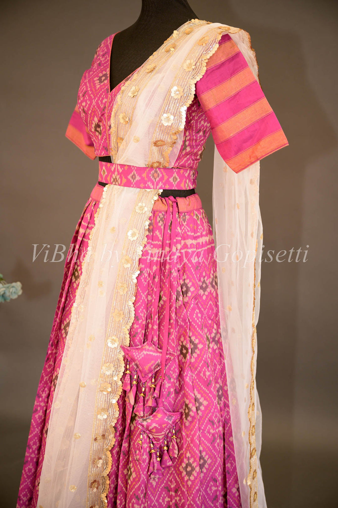 Lehengas - Magenta Patola Silk Lehenga With V Neck Blouse And Pearl White Embroidered Dupatta