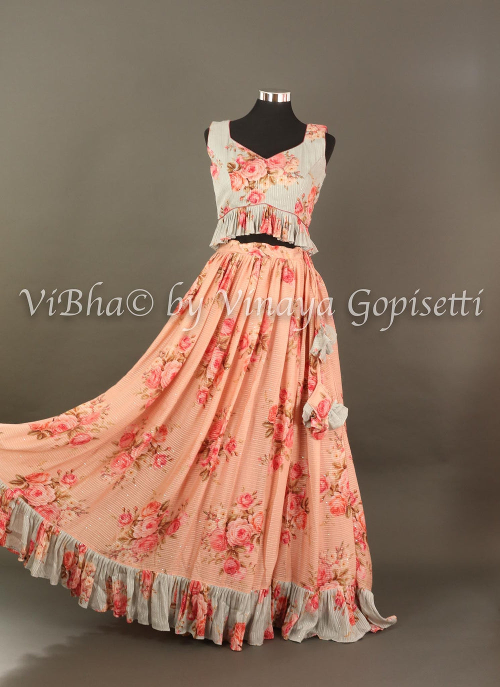 Lehengas - Peach And Powder Blue Floral Shimmery Georgette Skirt Croptop