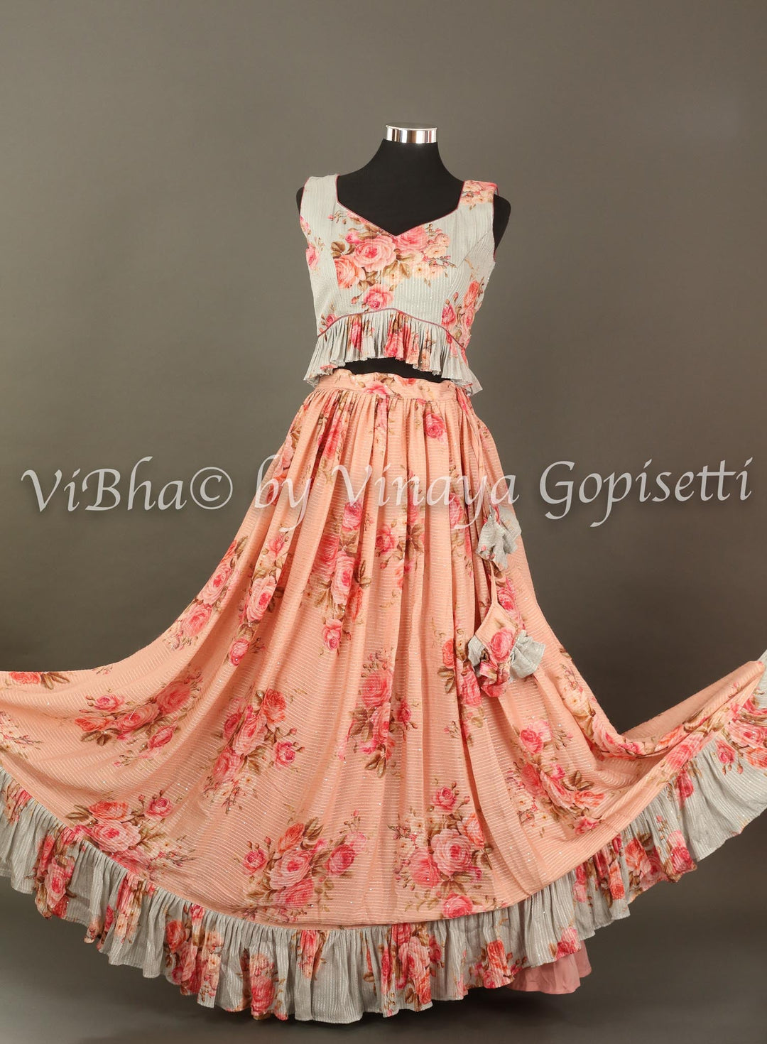 Lehengas - Peach And Powder Blue Floral Shimmery Georgette Skirt Croptop