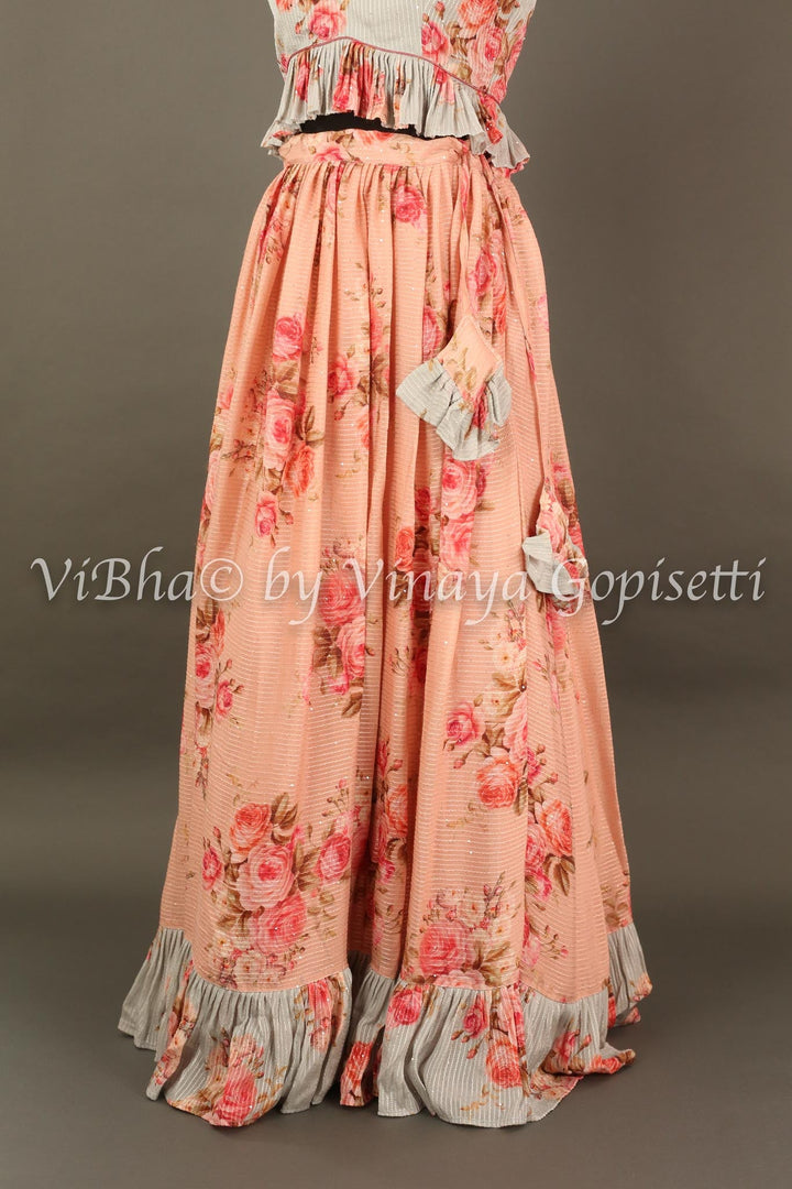 Lehengas - Peach And Powder Blue Floral Shimmery Georgette Skirt Croptop