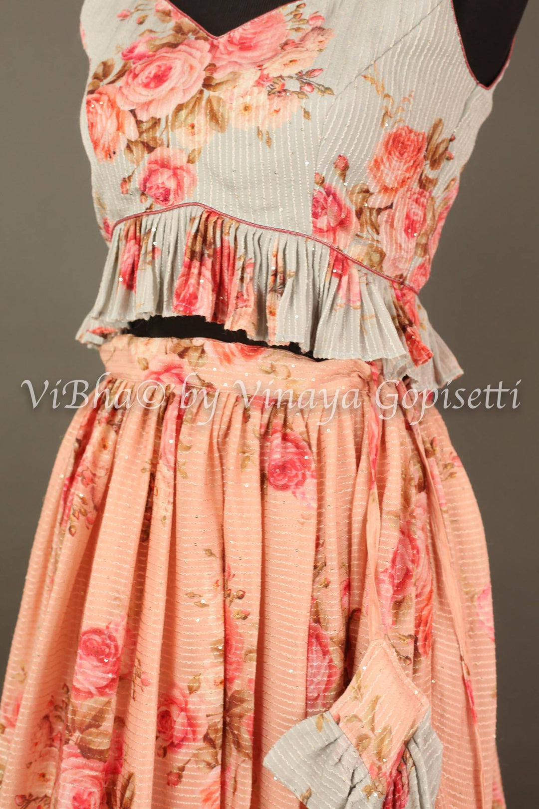 Lehengas - Peach And Powder Blue Floral Shimmery Georgette Skirt Croptop