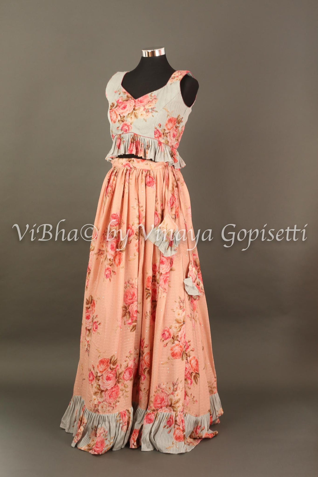 Lehengas - Peach And Powder Blue Floral Shimmery Georgette Skirt Croptop