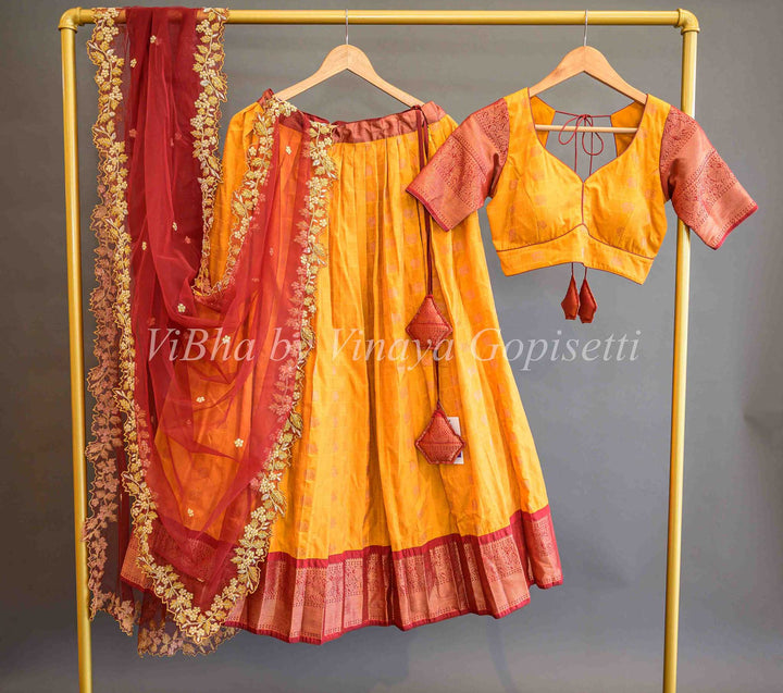 Lehengas - Turmeric Yellow And Maroon Red Kanchi Silk Halfsaree