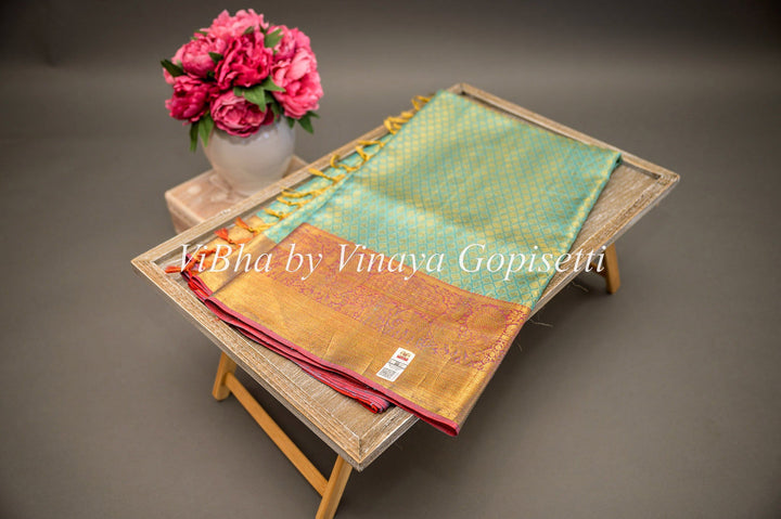 Sarees - Mint And Orange Kanchi Silk Saree