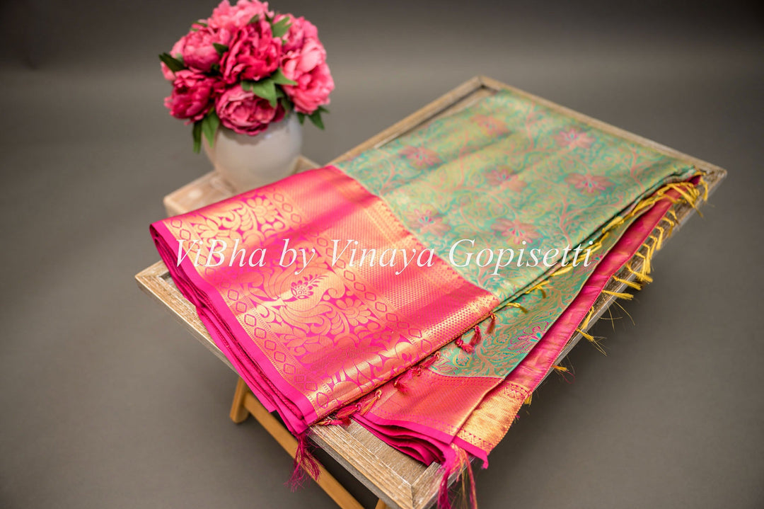 Sarees - Pastel Green And Rani Pink All Over Design Kanchi Silk Saree