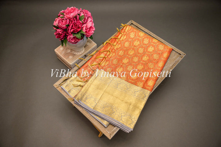 Sarees - Rust And Light Pastel Gold Tissue Kanchi Silk Saree