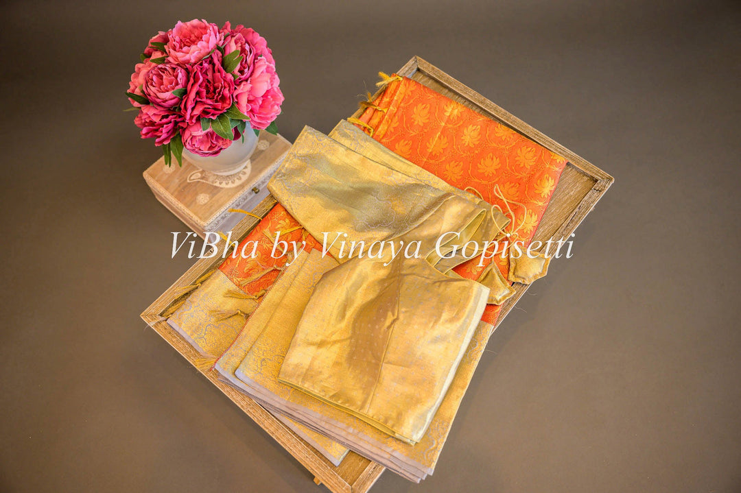 Sarees - Rust And Light Pastel Gold Tissue Kanchi Silk Saree